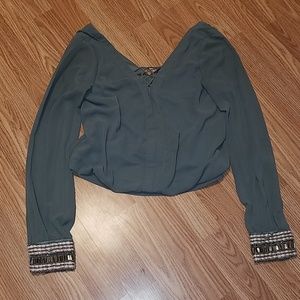 BKE boutique top with jeweled sleeves